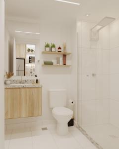 a white bathroom with a toilet and a shower at Moov 1417 Studio Mooca in São Paulo