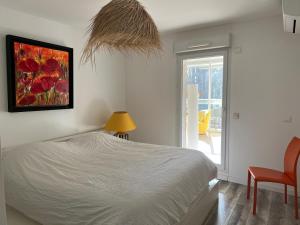 Posteľ alebo postele v izbe v ubytovaní Une pause…au soleil Classé 4 étoiles 108 m2 à 3min à pieds de la plage