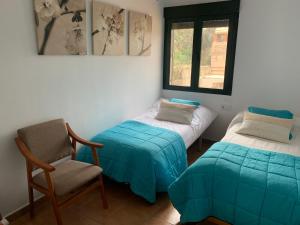 Postel nebo postele na pokoji v ubytování Mirador del Jerte