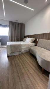 Łóżko lub łóżka w pokoju w obiekcie Moov 1417 Studio Mooca