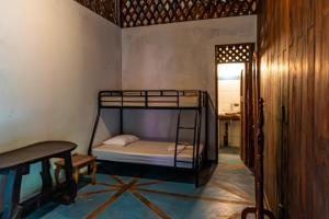 Krevet ili kreveti na kat u jedinici u objektu Casa Hacienda El Menco