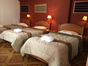 
A bed or beds in a room at El Jacal Classic
