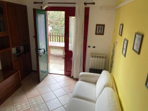 A seating area at Apartment Fabiola