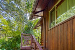 a wooden house with a ramp to the side of it at Punta Studio at Framadani Estate in San Ignacio