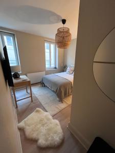 Posteľ alebo postele v izbe v ubytovaní Cosy House « Le Marila» en centre ville de Carcassonne