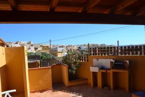 a balcony with a view of a city at Casa Vacanze da Giuseppina in Lampedusa