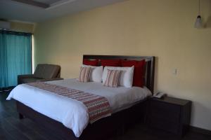 Letto o letti in una camera di Hotel Chapala Country