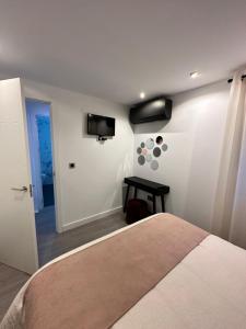 Televízia a/alebo spoločenská miestnosť v ubytovaní Moderno piso con vistas en Puerto de Sagunto VT-52189-V