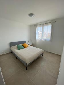 Posteľ alebo postele v izbe v ubytovaní Appartement 3 Chambres avec places de stationnement