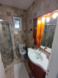 Ванна кімната в Apartment Ioanna #1