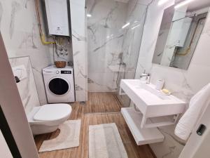 Bilik mandi di Stella Apartman Ruma