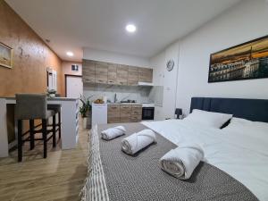 Katil atau katil-katil dalam bilik di Stella Apartman Ruma