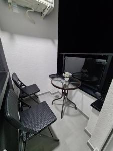 Ruang duduk di Stella Apartman Ruma