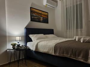 Katil atau katil-katil dalam bilik di Stella Apartman Ruma
