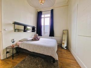 Posteľ alebo postele v izbe v ubytovaní Le Fontenelle Appartement hyper centre par beds76