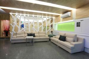 Posezení v ubytování Guo Chen Hotel