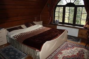 Tempat tidur dalam kamar di Łętowo dom z czterema sypialniami