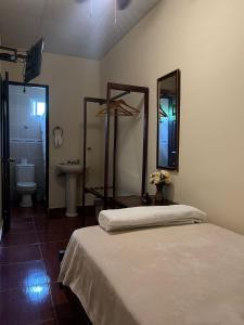 Katil atau katil-katil dalam bilik di HOTEL Ecológico BLUEROCK