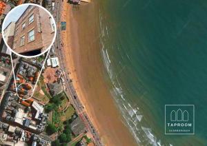 an overhead view of a beach and the ocean at Exclusive couples retreat with King bed in Scarborough