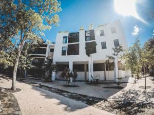 Galería fotográfica de Quinto Sol 18 - Apartment near beach - Rooftop pool - Aldea Zama en Tulum