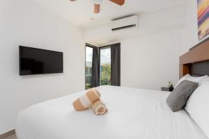 Galería fotográfica de Quinto Sol 18 - Apartment near beach - Rooftop pool - Aldea Zama en Tulum