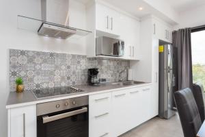 Galería fotográfica de Quinto Sol 18 - Apartment near beach - Rooftop pool - Aldea Zama en Tulum