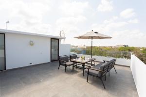 Galería fotográfica de Quinto Sol 18 - Apartment near beach - Rooftop pool - Aldea Zama en Tulum