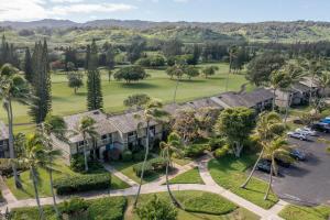 an aerial view of a resort with palm trees at Kuilima Estates West 120 in Kahuku