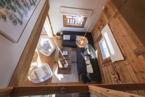 an overhead view of a living room in a tiny house at Chalet Planay - Megeve - Mont d'Arbois in Megève