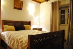 Кровать или кровати в номере Casa Do Cha
