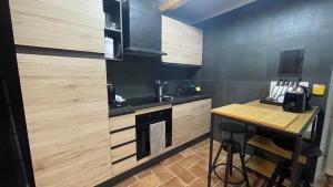 A kitchen or kitchenette at Onlyfor2 un nido d'amore per la coppia