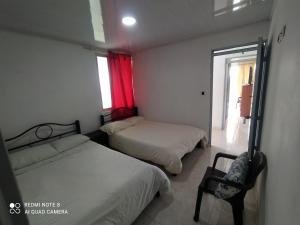 Postel nebo postele na pokoji v ubytování Casa turística Santa Helena y el Danubio