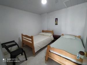 Postel nebo postele na pokoji v ubytování Casa turística Santa Helena y el Danubio