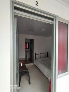 Postel nebo postele na pokoji v ubytování Casa turística Santa Helena y el Danubio