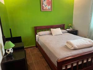 Katil atau katil-katil dalam bilik di HOTEL Ecológico BLUEROCK