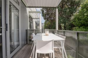 En balkon eller terrasse på Spacious Home Near CBD SPA Pool Parking 3BR