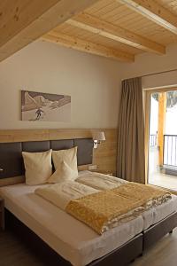 Ένα ή περισσότερα κρεβάτια σε δωμάτιο στο Laurins Lodge