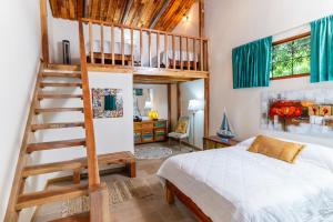 Postel nebo postele na pokoji v ubytování Hacienda La Norma Boho Boutique Hotel + 37 fotografií