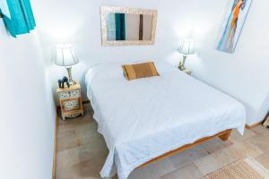 Voodi või voodid majutusasutuse Hacienda La Norma Boho Boutique Hotel toas