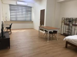 Postel nebo postele na pokoji v ubytování 享居Enjoy Live 民宿