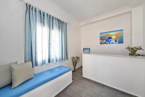 TV a/nebo společenská místnost v ubytování Alizea Villas & Suites