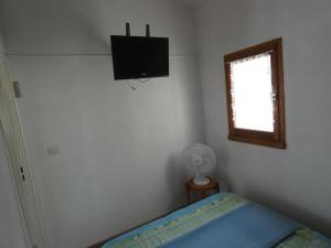 Televízia a/alebo spoločenská miestnosť v ubytovaní Maison 30m² avec piscine, terrasse, vélos, proche plage - Notre-Dame-de-Monts - FR-1-540-186