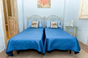 A bed or beds in a room at Casa Vacanza GICO'