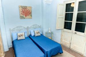 A bed or beds in a room at Casa Vacanza GICO'