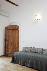 Posteľ alebo postele v izbe v ubytovaní LOFT D'ARCHITECTE SUR LE VIEUX PORT
