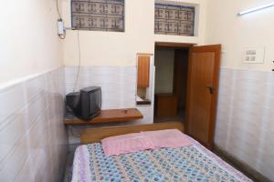 Postel nebo postele na pokoji v ubytování AMMAN LODGE