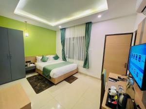 Postel nebo postele na pokoji v ubytování Hotel Aikawa