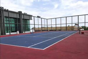 a tennis court in front of a building at Skyloft Premium Suites 8 pax in Johor Bahru