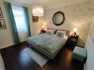 Posteľ alebo postele v izbe v ubytovaní Lake House