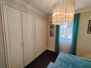 Posteľ alebo postele v izbe v ubytovaní Lake House